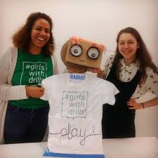 two women with a robot